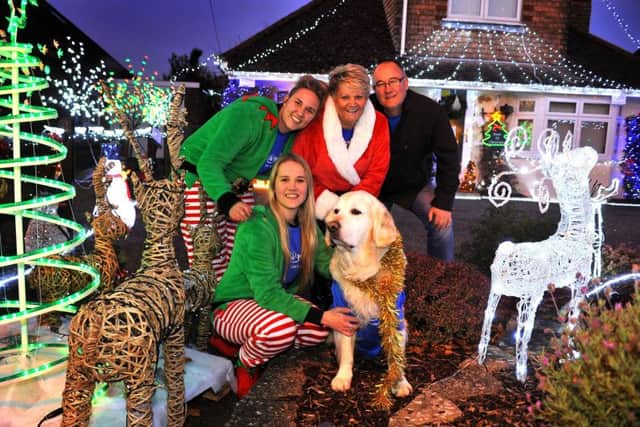 The King family turn on their annual Christmas lights display at their home to raise money for the Make A Wish Foundation.  Pic Steve Robards SR1729091 SUS-170112-183534001 SUS-170112-183534001