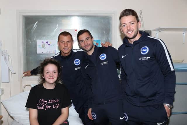Albion players Steve Sidwell, Markus Suttner and Dale Stephens during their visit