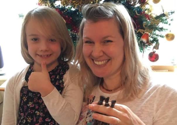 Lily Duggan, six, had a charity haircut to raise awareness of mum Louise Duggan's crowdfunding effort for Littlehampton baker Naomi Squires