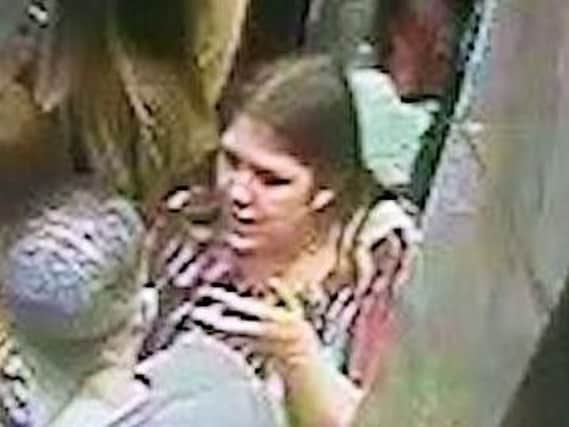 Police want to speak with this woman after a Bexhill woman had her face bitten in an Eastbourne kebab shop.
