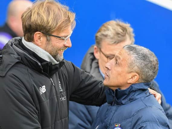 Chris Hughton pictured with Jurgen Klopp before Albion's match with Liverpool on Saturday. Picture by Phil Westlake (PW Sporting Photography)
