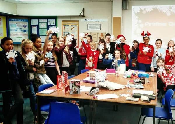 Ark Helenswood Academy with their Snowflakes last year SUS-171212-104254001