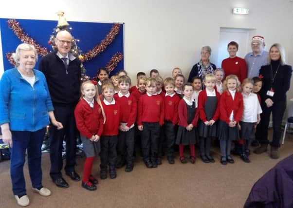 Rose Green Infant School Choir sang some Christmas songs at the party