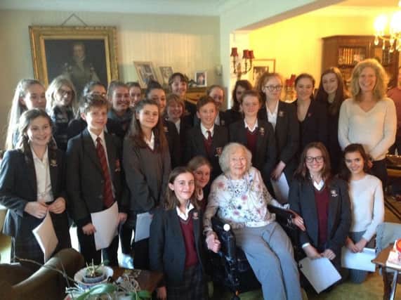 Dame Vera Lynn and the choir who brought her a carol concert