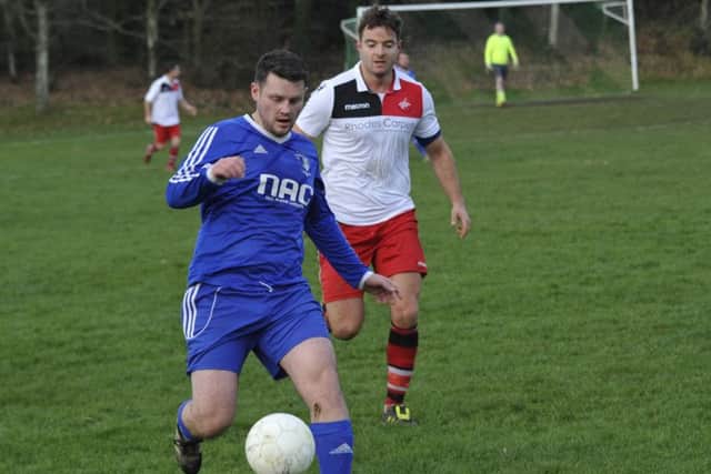 A St Leonards Social II player on the ball against Peche Hill Select.