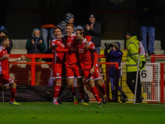 Crawley Town celebrate their opening goal against Mansfield.
Picture by Chris Holloway.