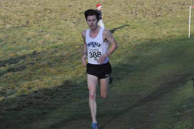 Ross Skelton comes home to win the Christmas Pudding Dash in Pett last December.