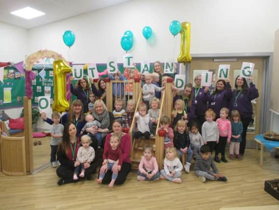 Staff and children at Robsack Wood Primary Academy's nursery celebrated an 'outstanding' rating. SUS-171213-115105001