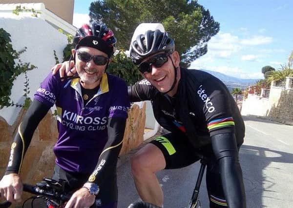 Ben Evans (right) on a cycle trip to Spain last year