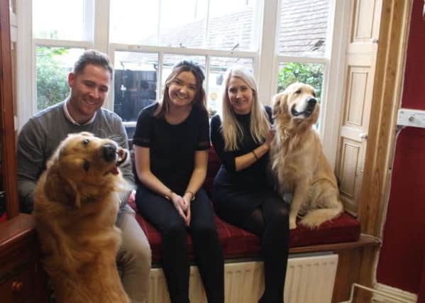Kain Lawrence, Abbie Atkinson, and Gina Madgwick, with Q dogs Bruce and Alfie