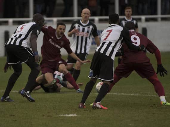 Action from Bognor's clash at Bath City last Saturday. Picture by Tommy McMillan