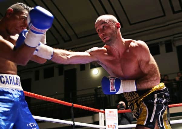 Ben Jones in action against Carlos Osorio (Nicaragua) at York Hall. Picture by Natalie Mayhew, Butterfly Boxing SUS-160811-120248002