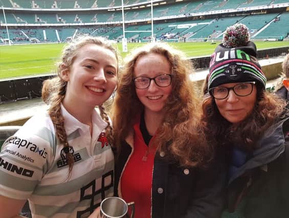 Day to remember: Bluebell Nicholls (left), her sister Matilda and Paula Peters at the stadium after the match