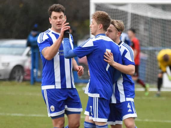 The Heath players celebrate the opening goal. Haywards Heath Town v AFC Uckfield Town. Picture by Grahame Lehkyj