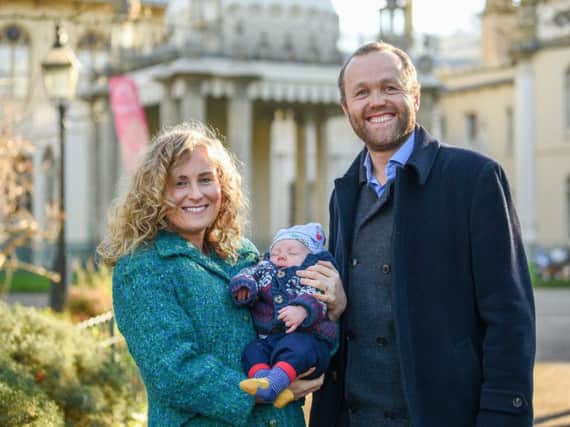 Councillor Alex Phillips with baby Rafi and husband Cllr Tom Druitt (Photograph: Simon Dack)