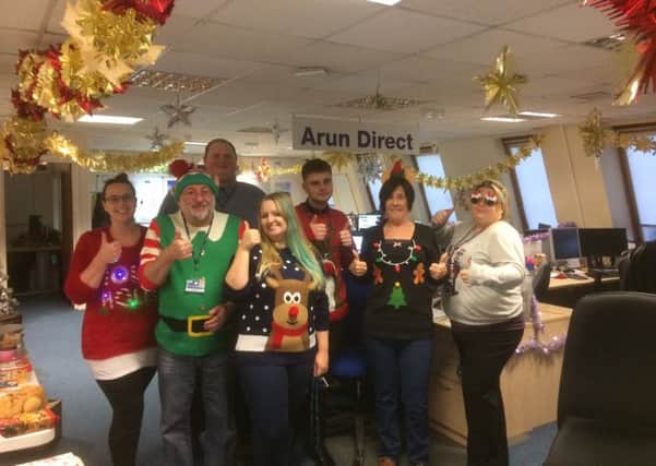 Arun Direct staff in their Christmas jumpers
