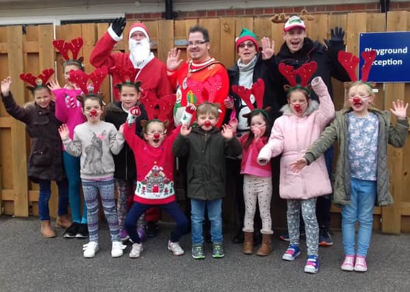 Littlehampton mayor Billy Blanchard-Cooper with some of the Reindeer Romp runners