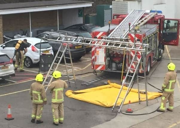 Firefighters outside the station. Picture: Phil Maynard