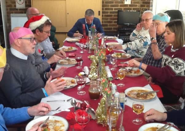 Worthing Town Cryers tuck into their thank you Christmas lunch