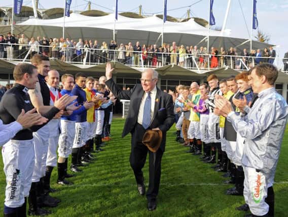 Seamus Buckley takes the acclaim of the jockeys as he bows out at Goodwood / Picture by Malcolm Wells