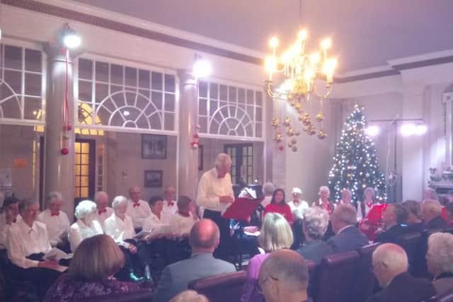 Carols were sung by 16 Ham Manor Singers