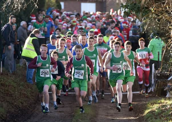 The field sets off at the start of the Christmas Pudding Dash in Pett on Saturday morning. Pictures by Justin Lycett