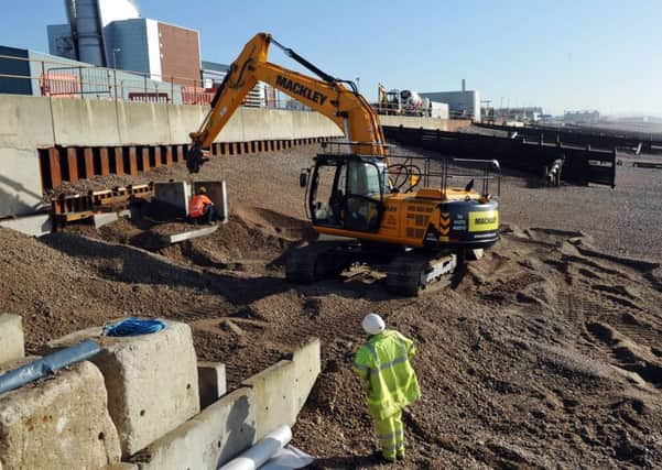 Work begins on Southwick Beach in March 2014, following the collapse of the promenade. Picture: Liz Pearce S09304H14