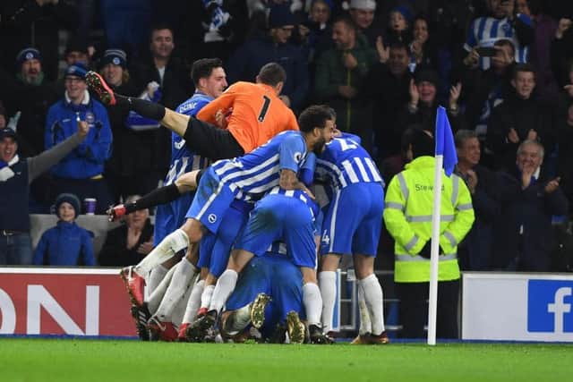 Albion players celebrate Pascal Gross' goal. Picture by Phil Westlake (PW Sporting Photography)