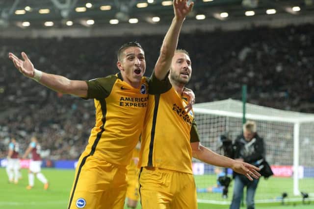 Anthony Knockaert and Glenn Murray celebrate the latter's second goal in the 3-0 win at West Ham. Picture by Phil Westlake (PW Sporting Photography)