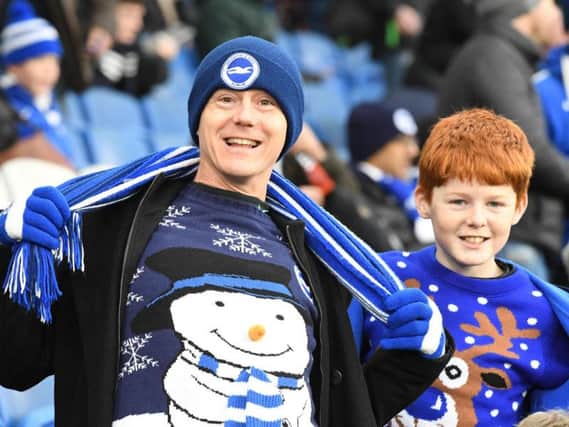 Albion fans pictured in their Christmas jumpers ahead of yesterday's 1-0 win against Watford. Picture by Phil Westlake (PW Sporting Photography)