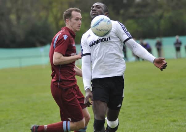 Action from the corresponding fixture between Little Common and Bexhill United last season. Picture by Simon Newstead