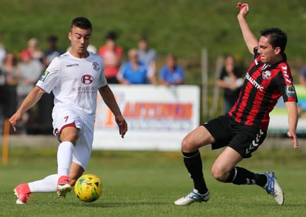 Davide Rodari on the ball for Hastings United during August's reverse fixture against Lewes. Picture courtesy Scott White
