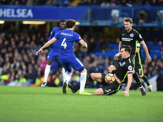 Dunk tackles Fabregas as Brighton visit Chelsea