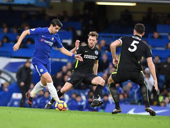 Dale Stephens and Lewis Dunk close down Chelsea striker Alvaro Morata. Picture by Phil Westlake (PW Sporting Photography)