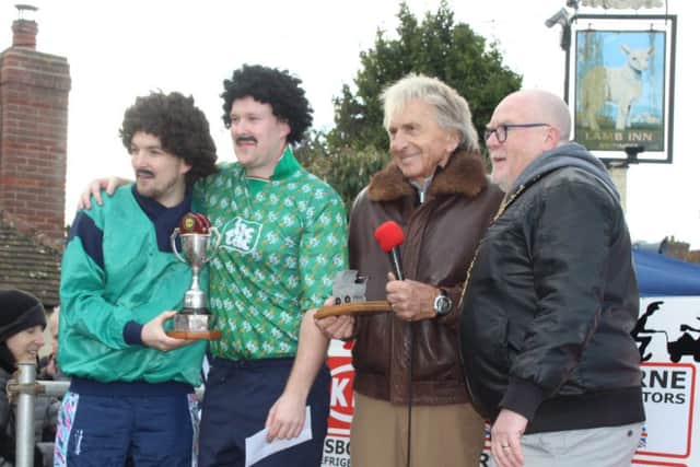 Derek Bell presents main race winners Calm Down, Calm Down  with their cup