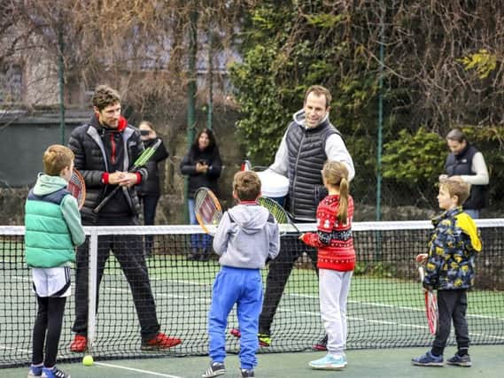 Greg Rusedski coaches some young Steyning Tennis Club members