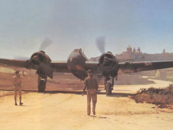 A Bristol Beaufighter pictured just after landing at Tal Qali airfield on the Mediterranean island of Malta in June 1943. The island had suffered a punishing siege and was severely bombed by massed fleets of German and Italian aircraft.