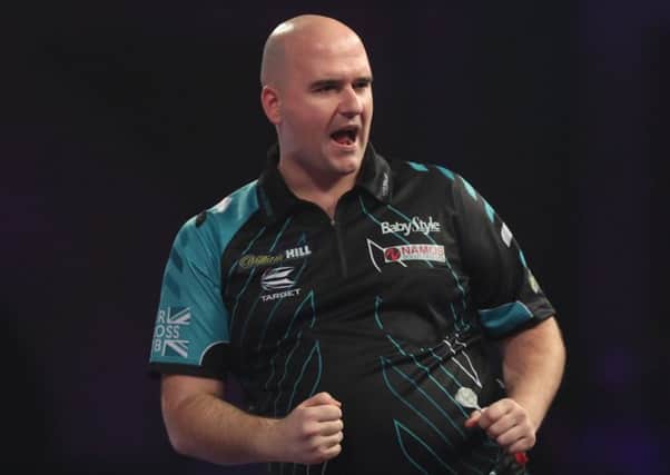 Rob Cross is through to the semi-finals of the William Hill World Darts Championship. Picture courtesy Lawrence Lustig/PDC