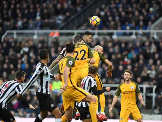 Shane Duffy attacks a set-piece during Albion's draw at Newcastle. Picture by Phil Westlake (PW Sporting Photography)