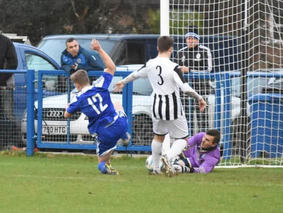 Joel Daly goes close. Haywards Heath Town v Peacehaven. Picture by Grahame Lehkyj