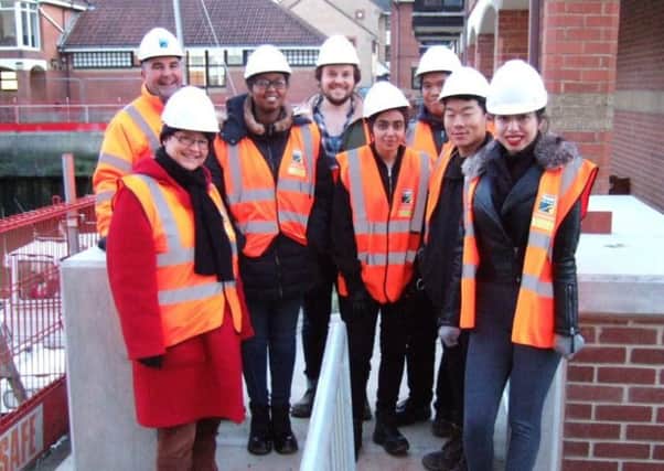 Dr Friederike GÃ¼nzel, senior lecturer in the University of Brighton's school of environment and technology, with the first-year civil engineering students