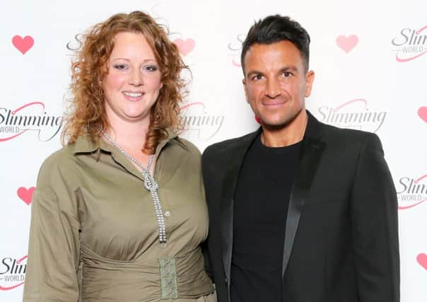 Amy Casey, Slimming World consultant, with singer Peter Andre at the annual awards event