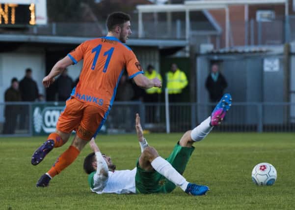 Jimmy Muitt is floored during Bognor's defeat to Havant / Picture by Tommy McMillan