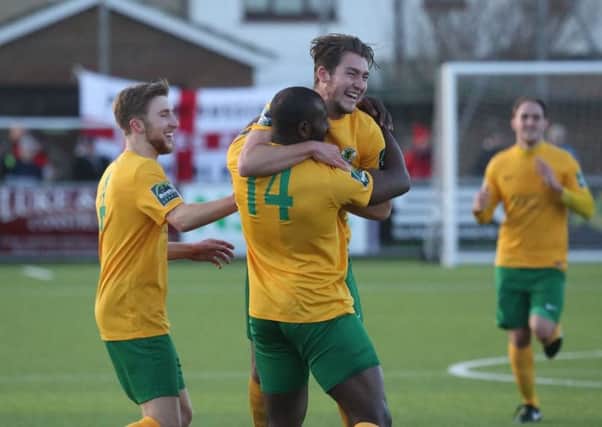 Hakeem Adelakun celebrates Horsham's second goal against Lewes on New Year's Day. Picture by John Lines
