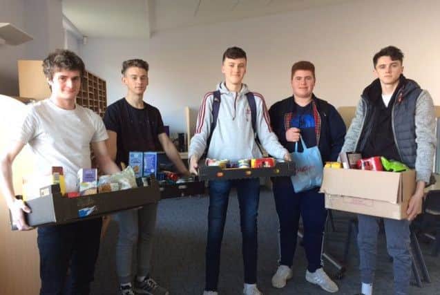 Students with the sixth form food donations