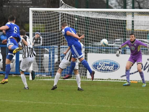 Action from Heath's win against Peacehaven on Saturday. Picture by Grahame Lehkyj