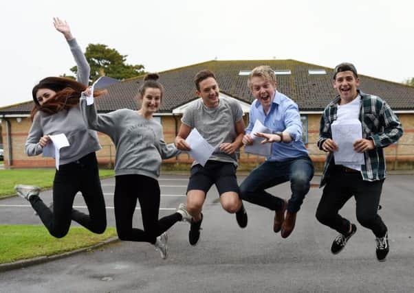 The Littlehampton Academy wants alumni to inspire their current students.
Pictured are the school's students celebrating their A-level results last year. Picture: Liz Pearce