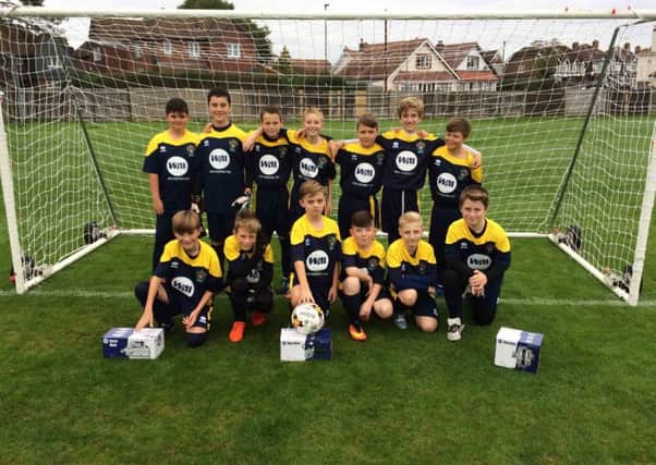 BRTFC under-12s with their new sponsored kits