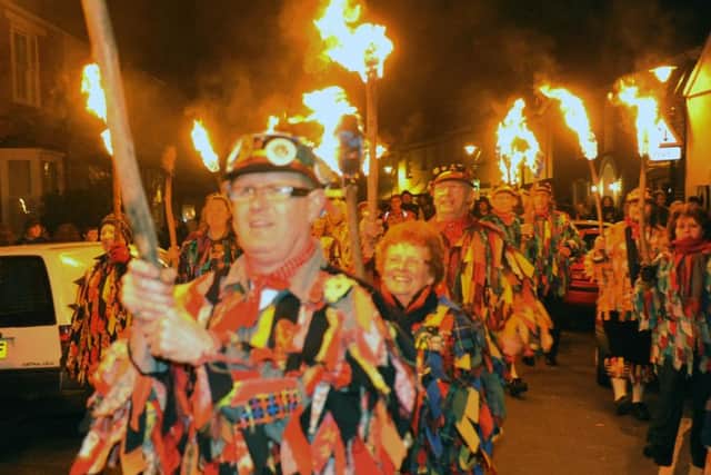 The Sompting Village Morris doing their Wassail in High Street Tarring