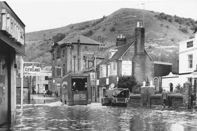 Natural disasters are no strangers to Lewes as the town is prone to flooding when the River Ouse bursts its banks. This photograph is from November 1960 and shows Malling Street under water. The 1836 avalanche occurred close by.
